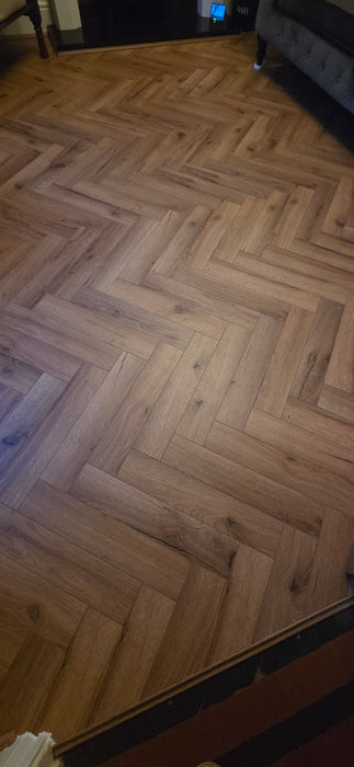 Warm Oak Helsinki 12mm Herringbone Laminate