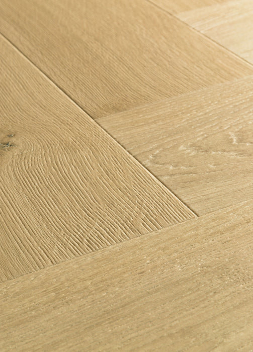 Quickstep | Impressive Design 8mm Laminate Herringbone Cardamom Oak