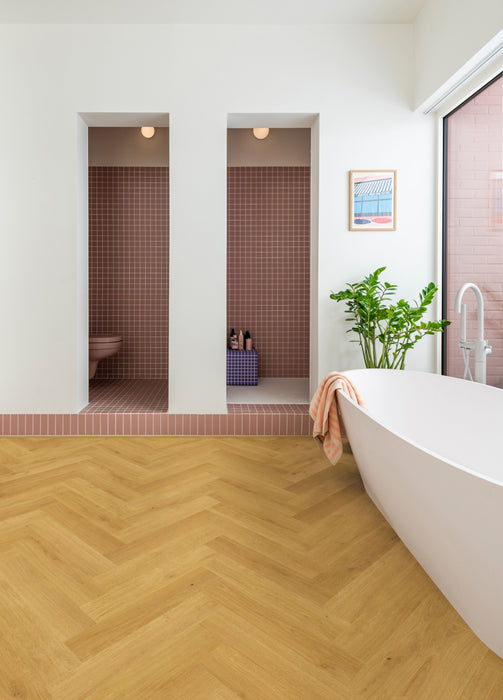 Quickstep | Impressive Design 8mm Laminate Herringbone Cumin Oak