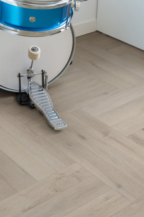 Coretec Authentics Alto planks laid in a triple herringbone pattern