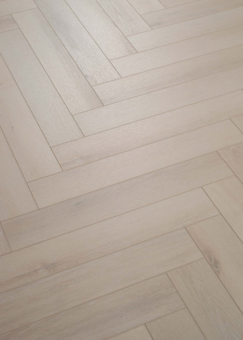 Coretec Authentics Alto herringbone flooring, angled close-up of the surface