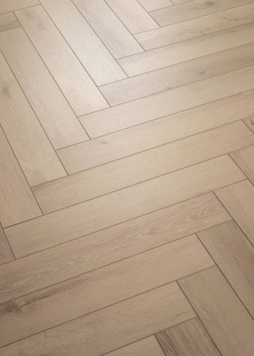 Coretec Authentics Nimbus herringbone flooring, angled close-up of the surface