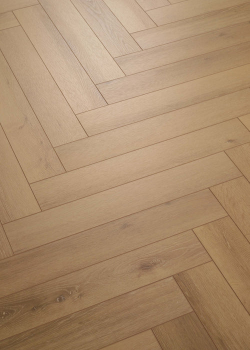 Coretec Authentics Regina herringbone flooring, angled close-up of the surface